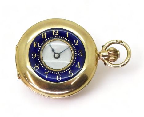 A LADIES HALF HUNTER FOB WATCH in 12ct gold with blue and gold enamelled chapter ring to the outer case, classic black & whit