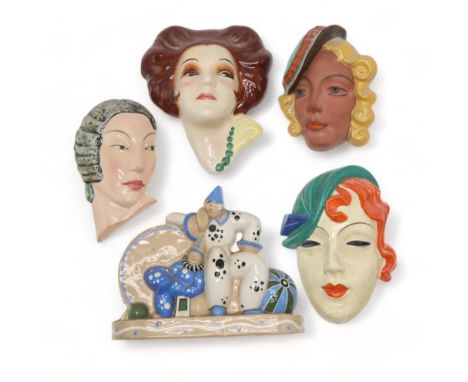 A COLLECTION OF CZECHOSLOVAKIAN ART DECO WALL MASKS all of girls' heads, some with incised and printed marks, others unmarked