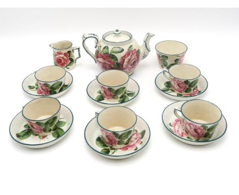 A WEMYSS WARE TEASET painted with cabbage roses, comprising teapot, six cups and saucers, milk jug and sugar bowl (9) Conditi