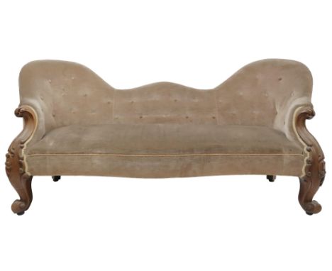 A 19TH CENTURY WALNUT FRAMED CONVERSATION SETTEE&nbsp; with light brown buttoned upholstery on carved scrolled front supports