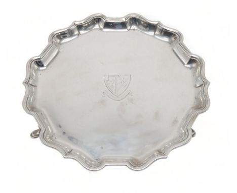 A LATE-VICTORIAN SILVER WAITER by James &amp; William Deakin, London 1900, of shaped circular form, with a chippendale-style 