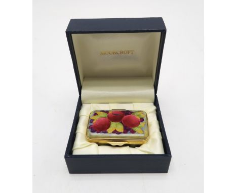 A MOORCROFT MINIATURE ENAMEL TRINKET BOX decorated in the Pomegranate pattern, 6cm wide, boxed Condition Report:"Nice conditi