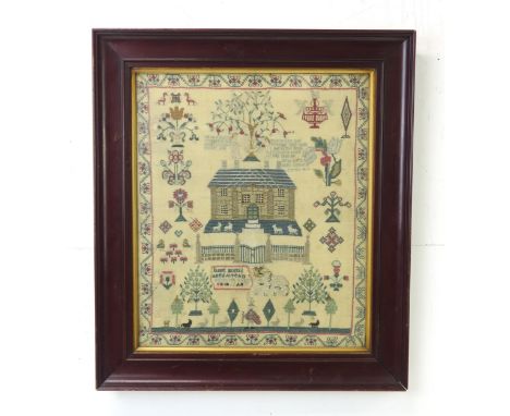 A 19TH CENTURY PICTORIAL NEEDLEWORK SAMPLER Executed by Janet Morris, Aged 10 Years, featuring a depiction of a country house