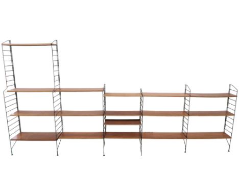 A MID 20TH CENTURY SWEDISH NISSE STRINNING, STRING MODULAR SHELVING SYSTEM&nbsp; comprising two stepped metallic uprights, 18