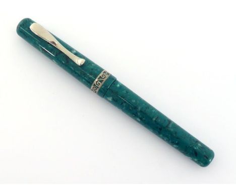 VISCONTI, a turquoise marbled resin fountain pen, wiht EF nib, ink window and piston filler mechanism, no box or paperwork, n