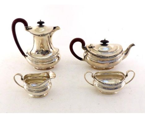 A four-piece silver tea service by Fenton, Russell & Co. Ltd., Birmingham, 1937, bellied oval with narrow Celtic style border