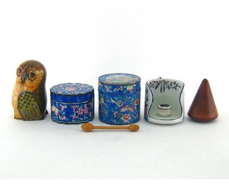 A mixed lot comprising a tapered boxwood plumber’s cone dolly, two decoratively enamelled brass tins, one with ribbed sides, 