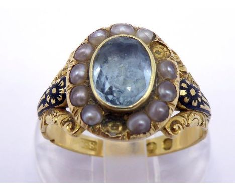 An early Victorian 18 carat gold, aquamarine, split pearl and enamel mourning ring, the central oval cut aquamarine 8 x 6mm, 