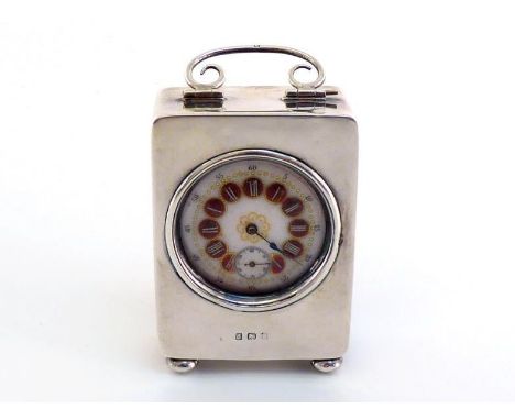 An Edwardian silver-cased boudoir clock, maker's mark rubbed, Birmingham, 1907, with 24 hour key wind movement, lacking adjus