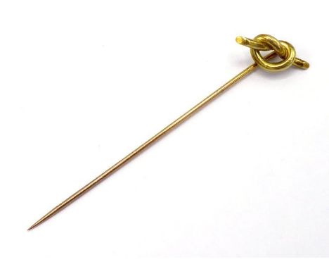 A French 18 carat gold stick pin, with love knot motif, French poincon, 6.5cm long, 1.2gms CONDITION: good 