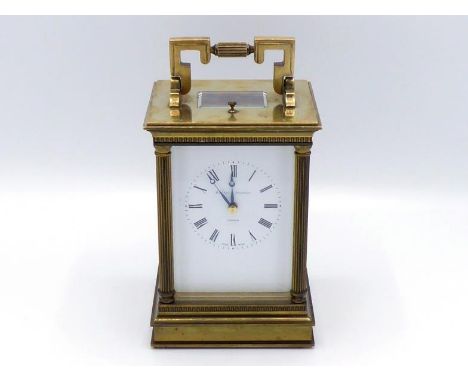 A modern gilt brass cased carriage clock by Matthew Norman with eight day hour and half hour striking and hour repeater mecha