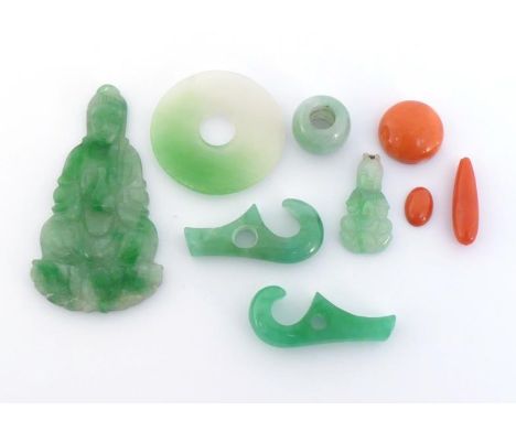A group of Chinese jadeite pendants and attachments, together with three loose coral items. 