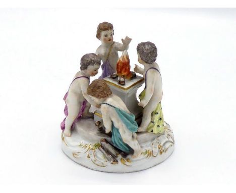Meissen. A small ceramic group of four putti tending a flame set on a short column, the underside of the base incised 2453 an