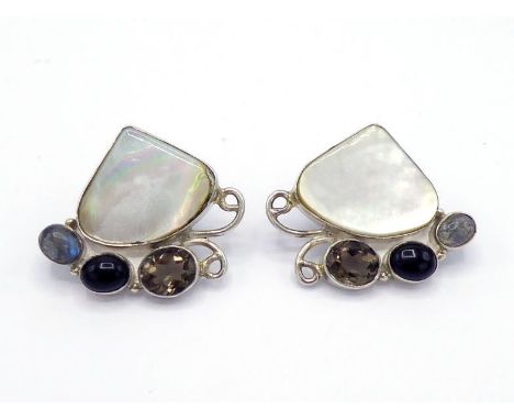 A pair of mother of pearl, smokey quartz, labradorite, and onyx earrings, in a fan design, mounted in white metal, 4.5cm wide
