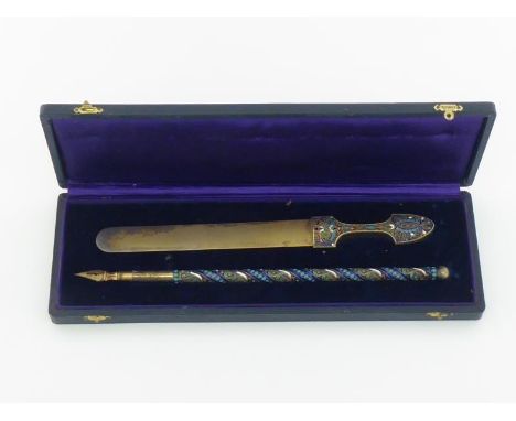 A good Russian silver-gilt and cloisonne enamel desk set comprising a dip pen and a paper knife with Caucasian kindjal handle