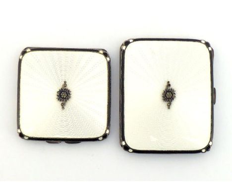A lady's cigarette case and matching compact by Adie Brothers Ltd., Birmingham, 1935, covers with oyster white guilloche enam