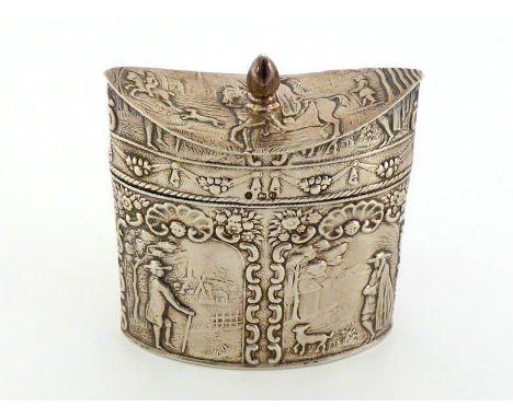 A Dutch silver caddy with pseudo marks and English import marks for London, 1891, navette form with incurved cover, chased wi