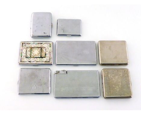 A group of eight plated cigarette cases variously decorated, including a combination cigarette case and lighter inscribed "Fr