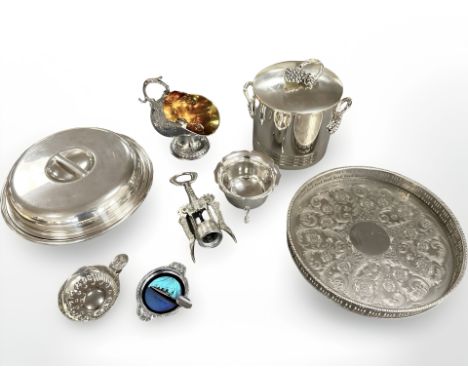 A group of silver plated wares to include dish and cover, sugar scuttle, bottle opener, HMS Queen Mary ashtray with South Ame