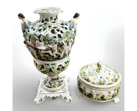 A Capodimonte porcelain lidded jar and cover, height 15 cm, together with a further Capodimonte urn, height 40 cm (2) 