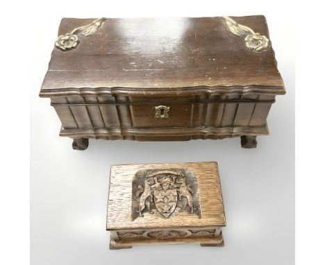 An antique oak musical jewellery casket, width 16 cm, together with a further jewellery box with brass metal mounts. (2)