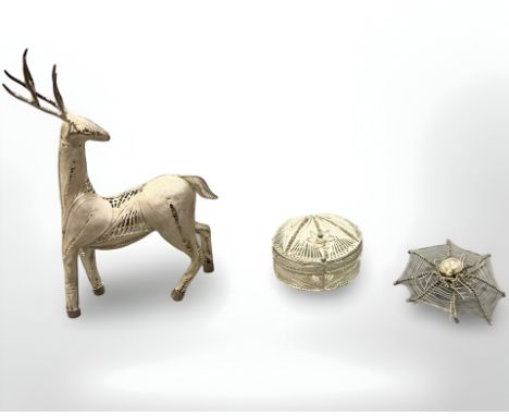 Three pieces of continental silver filigree, including a reindeer ring stand, antique Chinese spider on web forming a place h