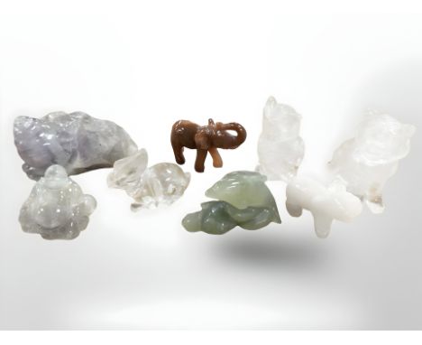 A small group of polished crystal and gem stone animal figures including jade dolphin, lion, elephant, rabbit etc (8)