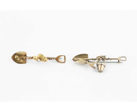 Two 19th century prospectors' bar brooches, each modelled as a shovel with wirework rope and nuggets, the first with pickaxe 
