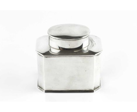 A silver tea caddy, of chamfered rectangular form, with oval cover, by Stokes &amp; Ireland Ltd., Chester 1919, 9cm high, 5.5