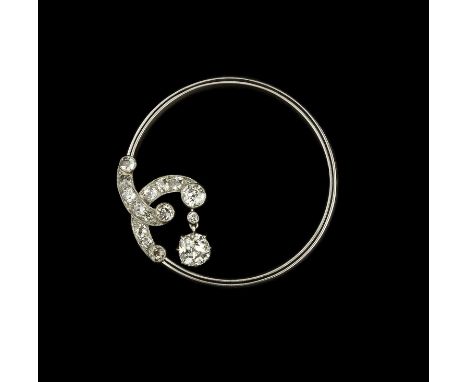 A diamond circlet brooch, circa 1920-30, the reeded circlet applied with two entwined scrolled and millegrained channels of g
