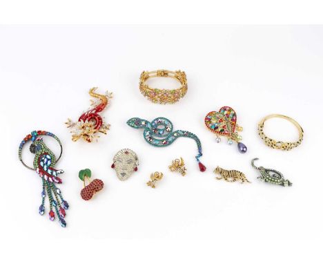 A collection of costume jewellery by Butler &amp; Wilson, comprising a bird of paradise brooch, a Chinese dragon brooch, a se