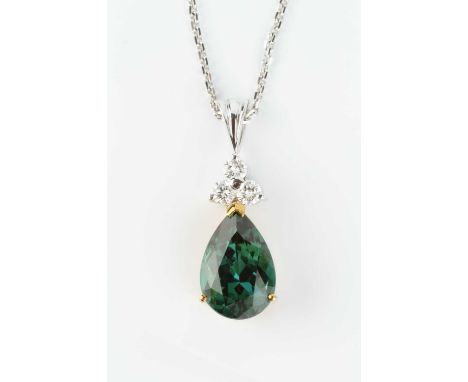 A green tourmaline and diamond pendant on chain, the pear-shaped mixed-cut green tourmaline claw set below a trio of round br