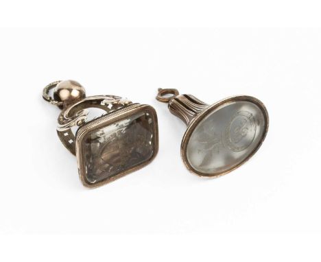 Two 19th century hardstone seal fobs, the first of fluted design, with beaded C-scroll mount and cushion-shaped smoky quartz 