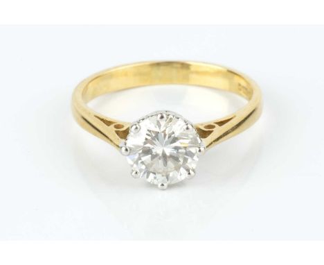 A diamond single stone ring, the round brilliant-cut diamond in eight claw setting, 18ct two colour gold mounted, diamond wei