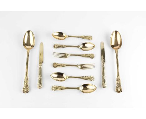 A service of William IV silver gilt King's pattern flatware, comprising four table spoons, twenty-four dessert spoons and twe