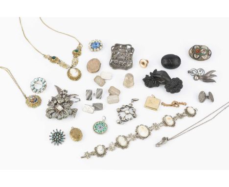 A collection of jewellery, to include two gilt metal locket pendants, a Danish white metal foliate panel brooch, a white past