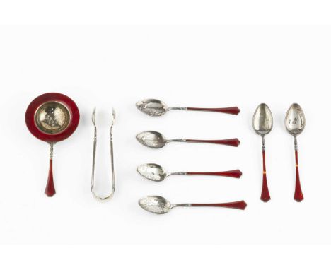 A Norwegian silver gilt and red enamel tea serving set, comprising six tea spoons, tea strainer and tongs, by Aksel Holmsen, 