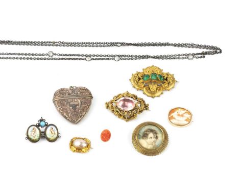 A collection of 19th century and later jewellery, comprising a late Victorian single stone panel brooch, of scrolled design, 