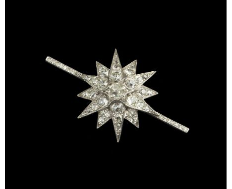 A diamond star brooch, highlighted with graduated cushion-shaped old-cut diamonds and rose-cut diamond points, on later bar f