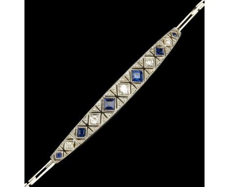 A sapphire and diamond set panel bracelet, the boat-shaped panel with articulated terminals, pierced and millegrain set with 