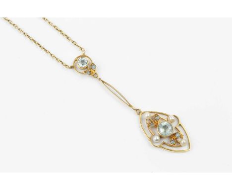 An early 20th century aquamarine and seed pearl pendant necklace, the openwork navette-shaped drop with foliate accents, cent