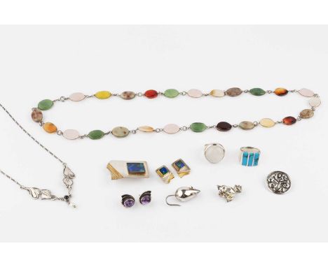 A collection of silver and white metal jewellery, comprising a Danish mouse brooch by Hugo Grün &amp; Co., stamped 'STERLING 