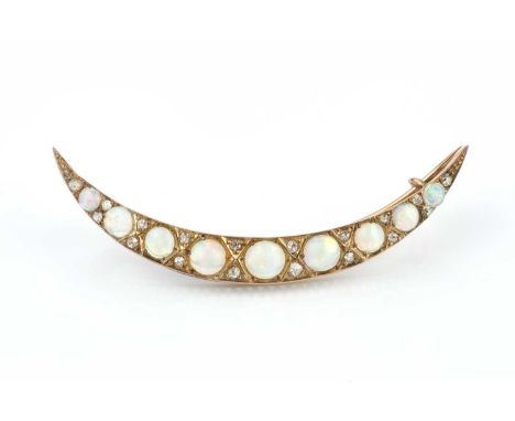 A late Victorian/Edwardian opal and diamond crescent brooch, designed as a line of graduated cabochon opals, spaced by pairs 