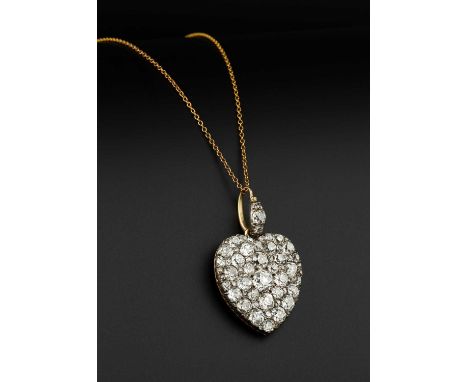 A late Victorian diamond heart pendant, pavé set with a cluster of graduated cushion-shaped old and single-cut diamonds, bord
