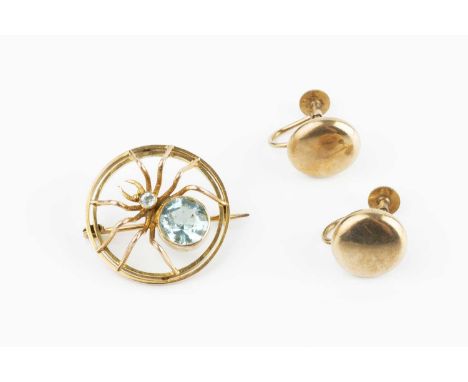 A 9ct gold spider brooch, of openwork design, highlighted with circular mixed-cut blue stones, and a pair of ear clips, of ci