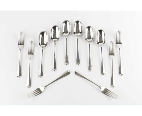 A part service of silver Hanoverian pattern flatware, comprising six table forks, six table spoons, four dessert spoons, a de