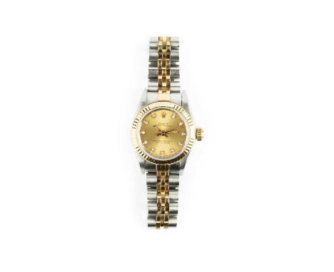 A lady's stainless steel, yellow gold and diamond set automatic 'Oyster Perpetual' bracelet watch by Rolex, the circular dial