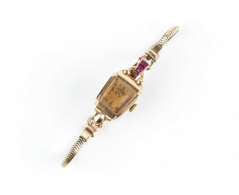 A lady's gem set bracelet watch by Blancpain, the trapezoid-shaped gilt dial with Arabic quarters and bead markers, to a poli