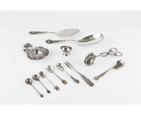 An Indonesian Yogya silver serving spoon, and similar serving slice, both stamped ZN800, a pair of Continental serving tongs,
