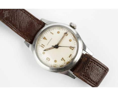 A stainless steel wristwatch by Longines, the circular dial with arrowhead, bead and baton markers alternating with Arabic nu